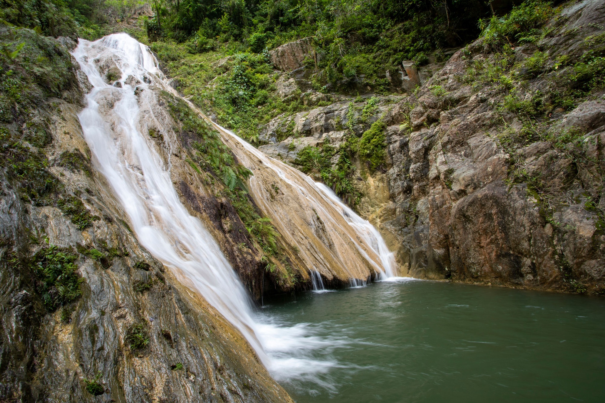 Landscape of Waterfall in Soroa, (Vinales) Pinar del Rio, Cuba with green plants